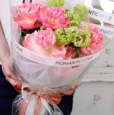 Goede prijs. Flower OPP film, cellophane, Engels papier, doorzichtig wit waterdicht, doorzichtig boeketverpakkingspapier, bloemenwinkelmaterialen online