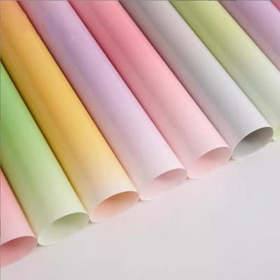 Goede prijs. Kleurige snoepjes, glas waterdicht plastic, bloemenverpakkingspapier, boeketverpakkingsmateriaal, bloemenwinkelbenodigdheden, directe levering van de fabriek online