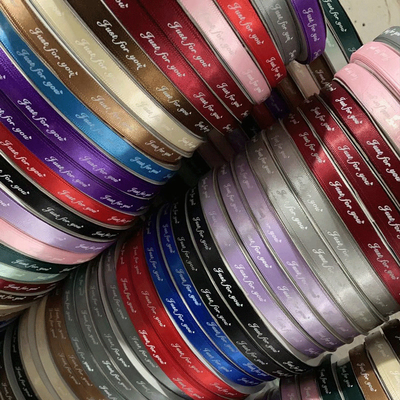 Goede prijs. Verpakkingen voor bloemen, lint, zijdeband, polyesterband, gedrukte Engelse cadeaubonverpakkingen, boeketverpakkingsmateriaal, band online