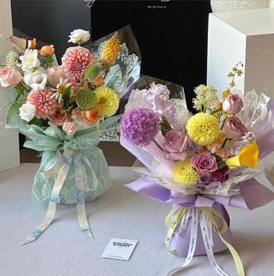 Goede prijs. Bloemliefde, Volksdag, klein kant, cellophane, kantgrens, waterzak, bloemenpapier, bloemenwinkel, populair boeketverpakkingsmateriaal online