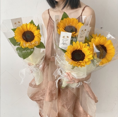 Goede prijs. Dag van de leraren Engels transparante opp plastic waterdicht cellophane bloemen verpakkingsmateriaal Zonnebloem boeket wikkelpapier online
