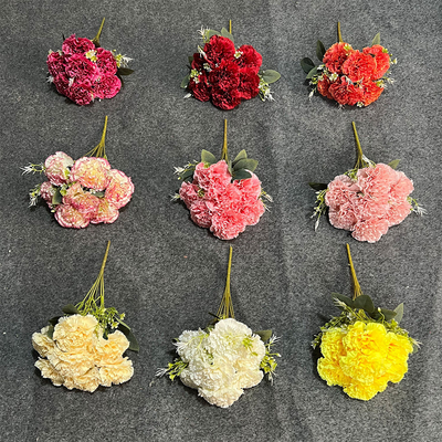 Goede prijs. 7-hoofdig anjer simulatie kunstmatige nep boeket kunstmatige plastic bloem high-end woonkamer decoratie bruiloft bloemenarrangement online