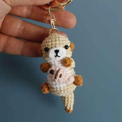 Goede prijs. Breien Amigurumi schattig pluis Otter vasthouden vis sleutelhanger Oyuncak haakdier speelgoed pop zachte haak Otter sleutelhangers online